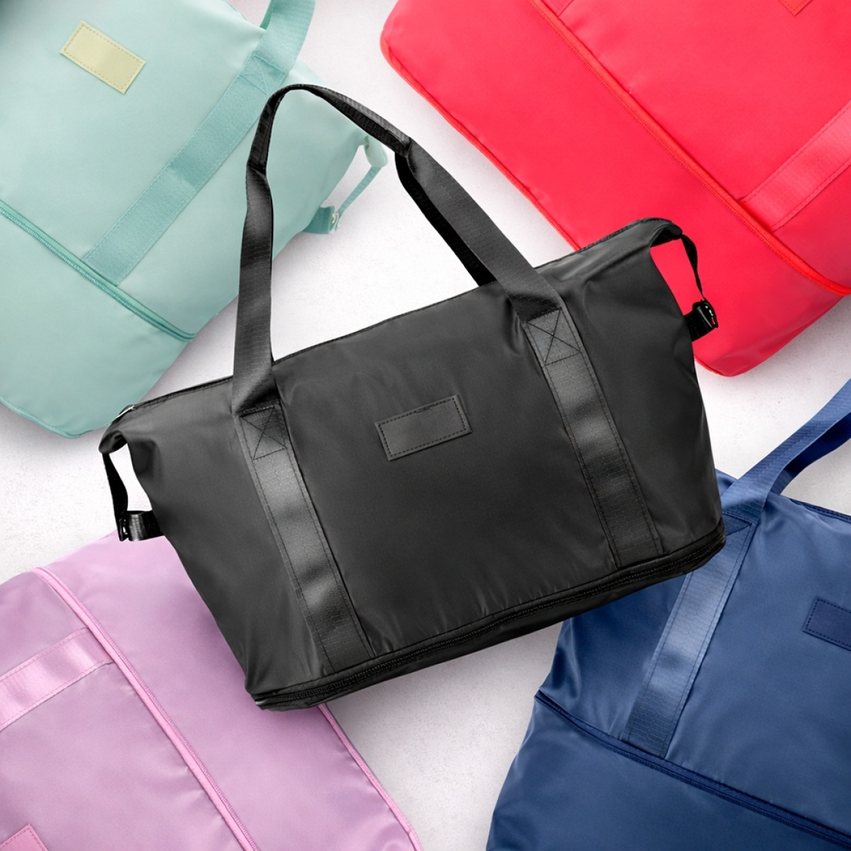 BOLSA ESPORTIVA POLIÉSTER EXPANSÍVEL 36 LITROS