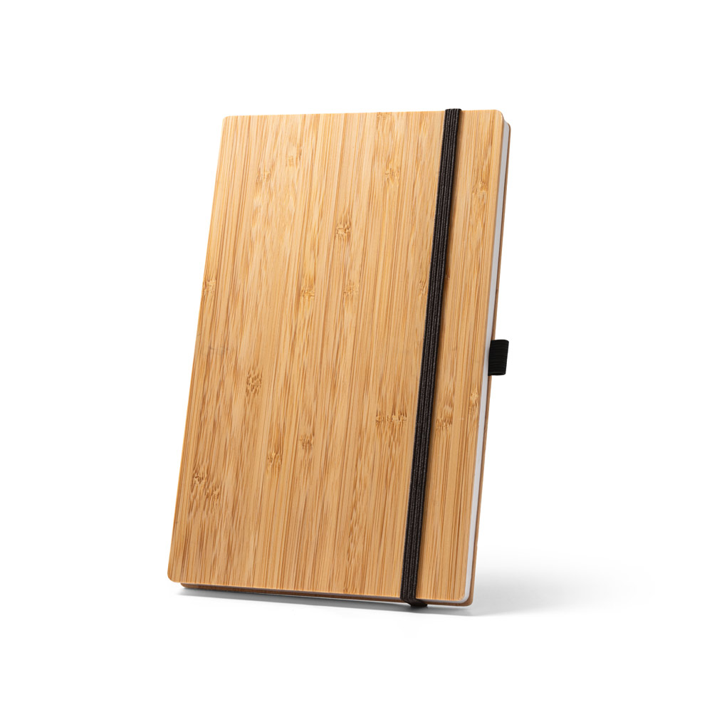 Caderno A5 de capa e contracapa em placa de bambu e lombada em PET 100% reciclado, com 192 páginas pautadas