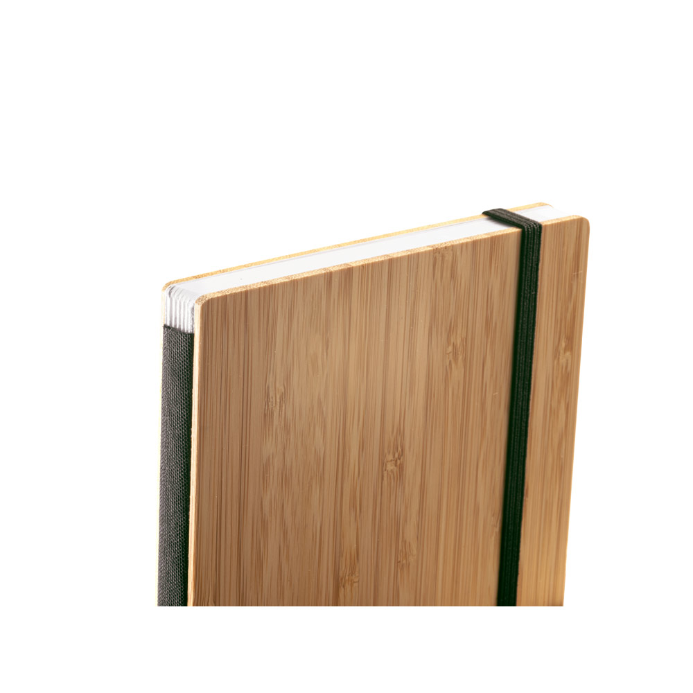 Caderno de bolso com capa e contracapa em placa de bambu e lombada em PET 100% reciclado, com 160 páginas lisas