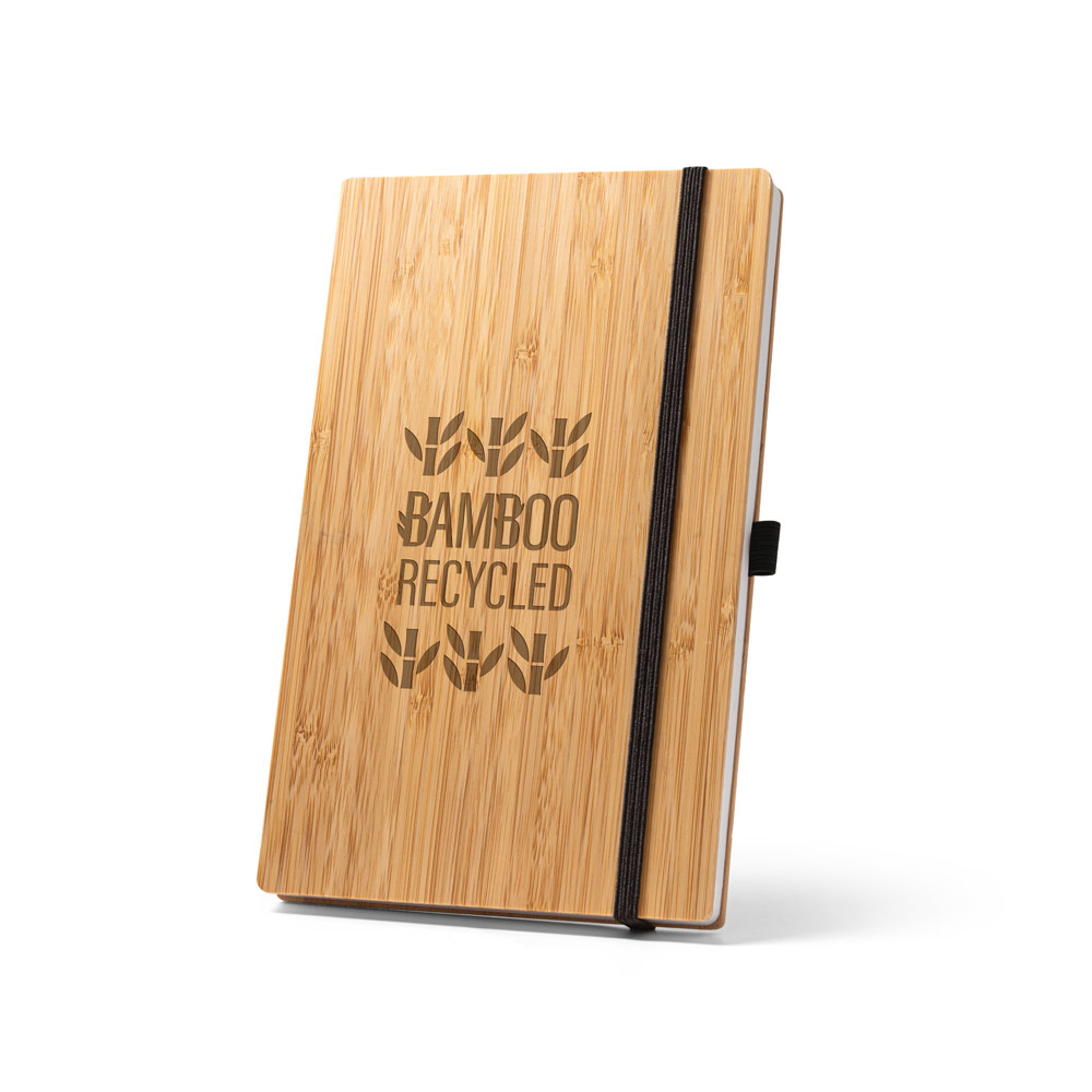Caderno de bolso com capa e contracapa em placa de bambu e lombada em PET 100% reciclado, com 160 páginas lisas